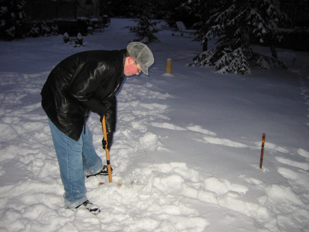 The Punisher takes his croquet shot in the Christmas snow, 2002