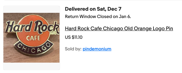 Screenshot of eBay auction result for Hard Rock Cafe Chicago Old Orange Logo Pin sold by pindemonium