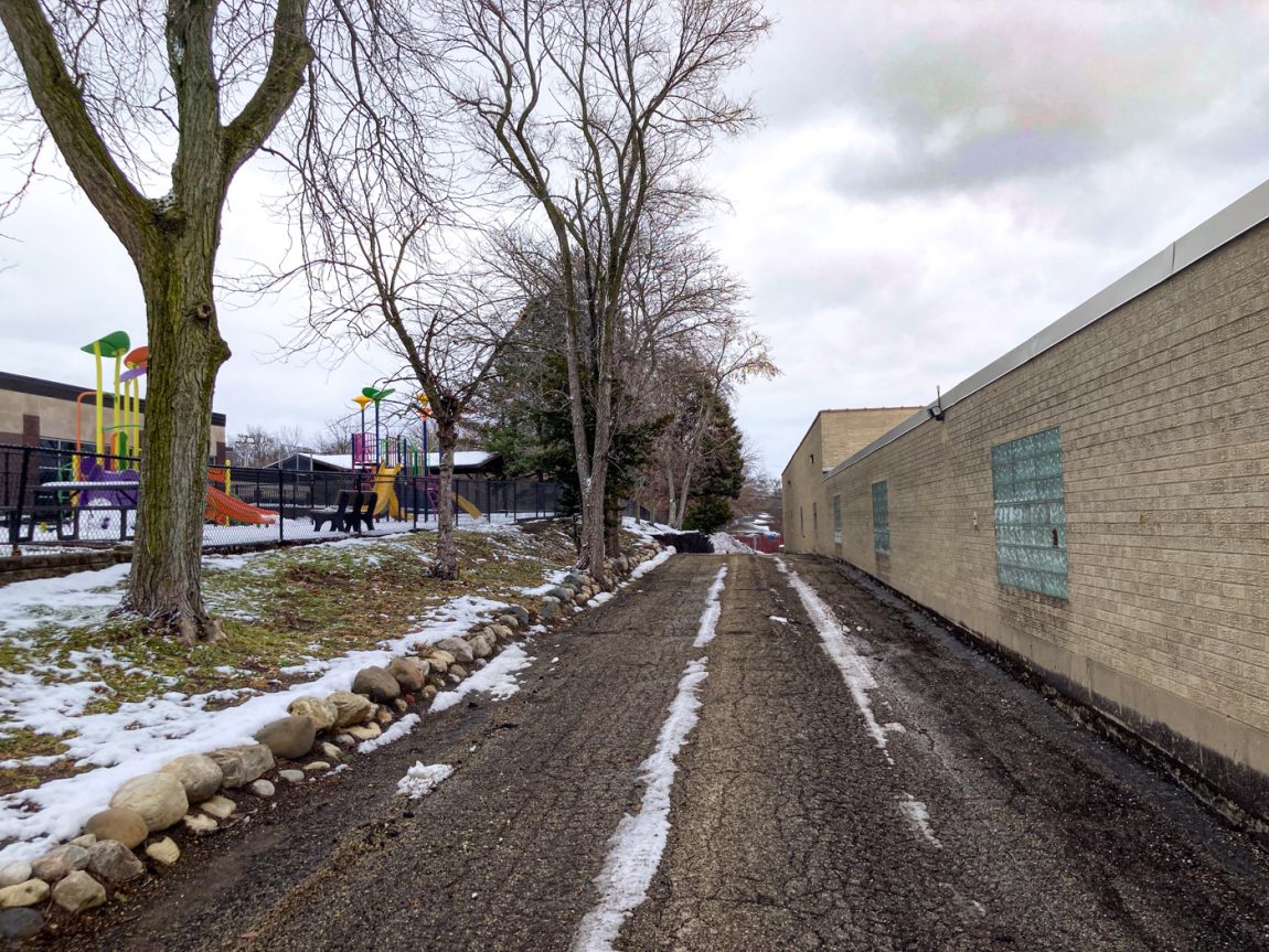 Alley behind Dreisilker Electric Motors at 352 Roosevelt Rd, Glen Ellyn, IL 60137. Very little snow in the alley.