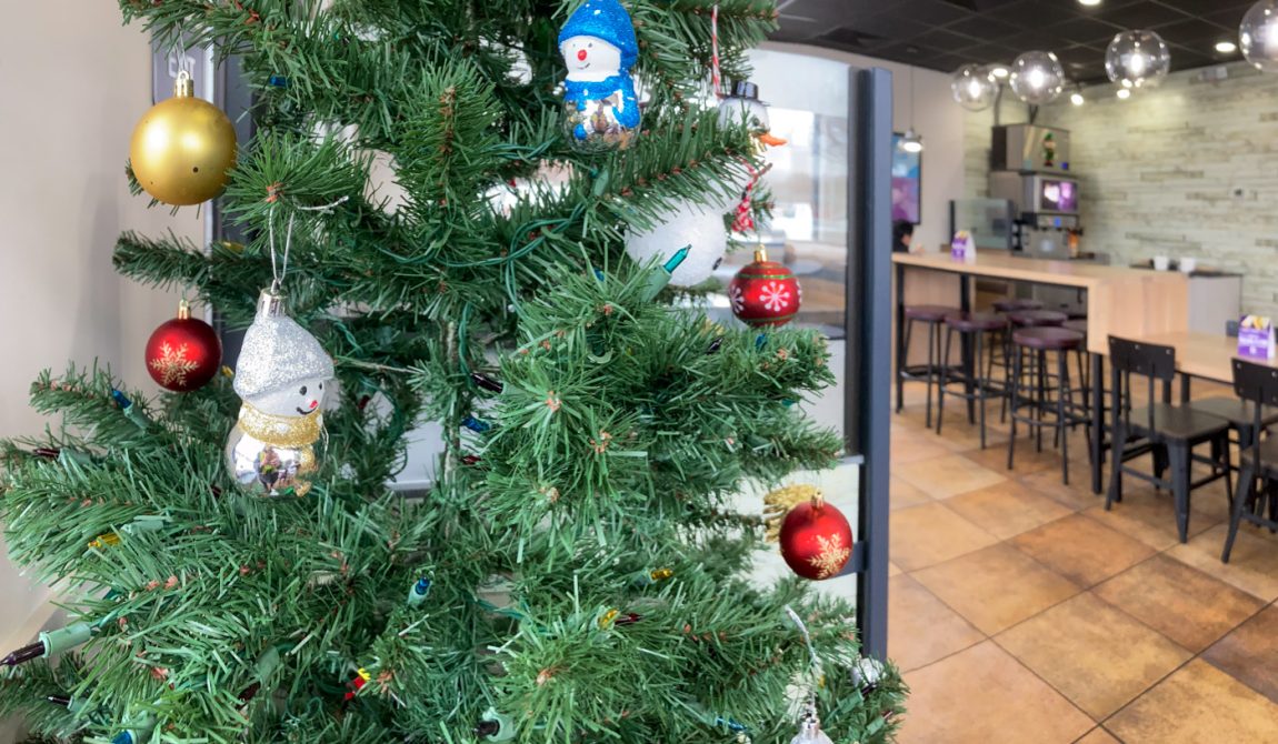 Interior of Taco Bell, 370 Roosevelt Rd, Glen Ellyn, IL 60137. Christmas tree decoration in restaurant