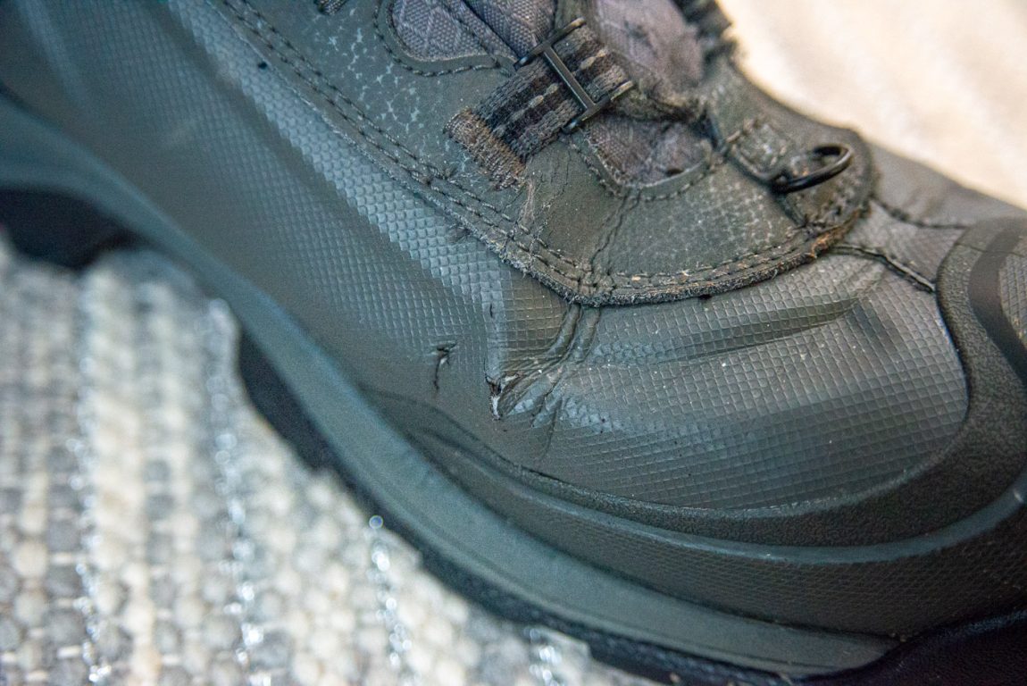 closeup photo of right boot with minor cracking by where the toes bend
